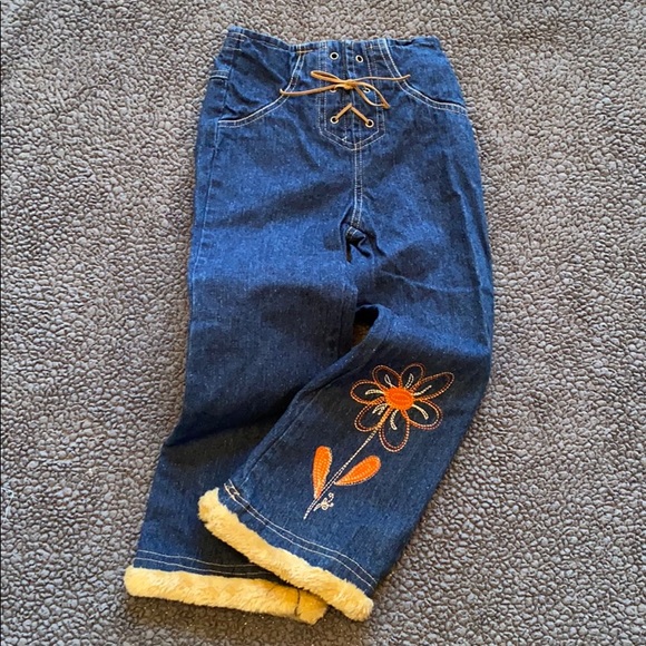 Jeans with faux fur hem. Look for matching jacket - Picture 1 of 5